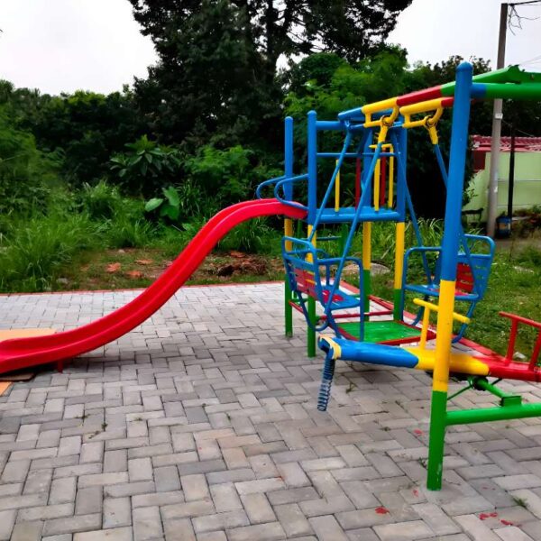 Playground slide with swing