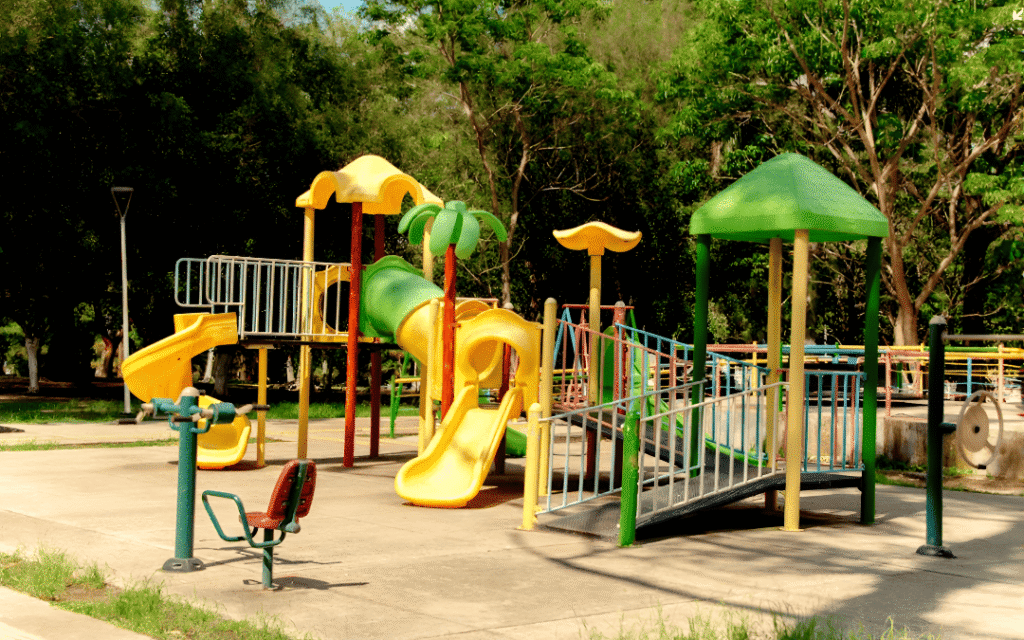 Difference Between FRP and Metal Playground Equipment in a modern school playground